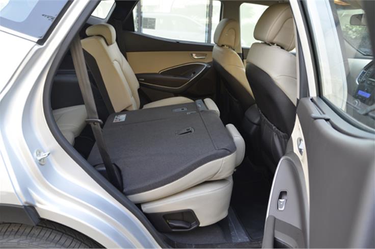 The middle row offers great comfort and space but the base doesn't tip forward, which hampers access to the rear