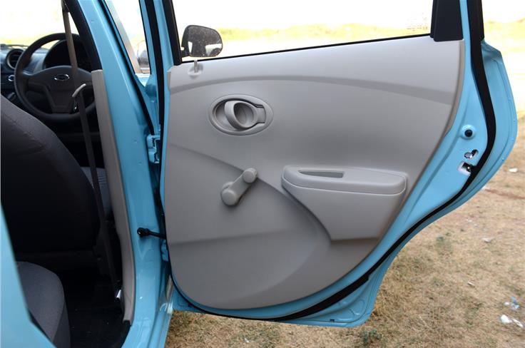 Rear doors don't get door pockets and even top-end variants of the Go don't get rear power windows.