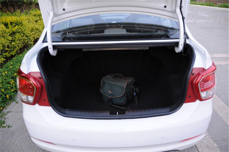 The Hyundai Xcent has a 407 litre boot. 