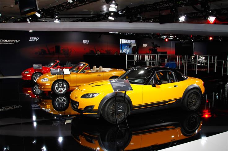 Mazda is showing its heritage of the MX-5 Miata sports car at the NY show. 