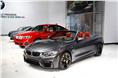 The new 425bhp BMW M4 convertible is also on display. 