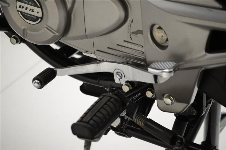 The five-speed gearbox shifts in the one-down four-up pattern via a heel and toe shifter.