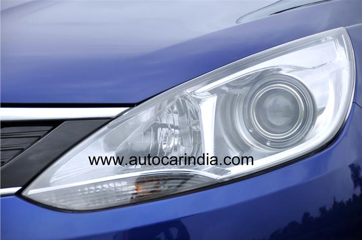 Stretched headlamps look sporty and aggressive. The Zest also gets projector lights. 