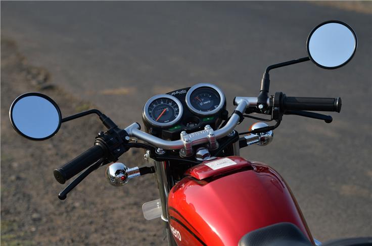 Analogue display has a side-stand engage light. M-type handlebar often used for caf&#233; racer styling.