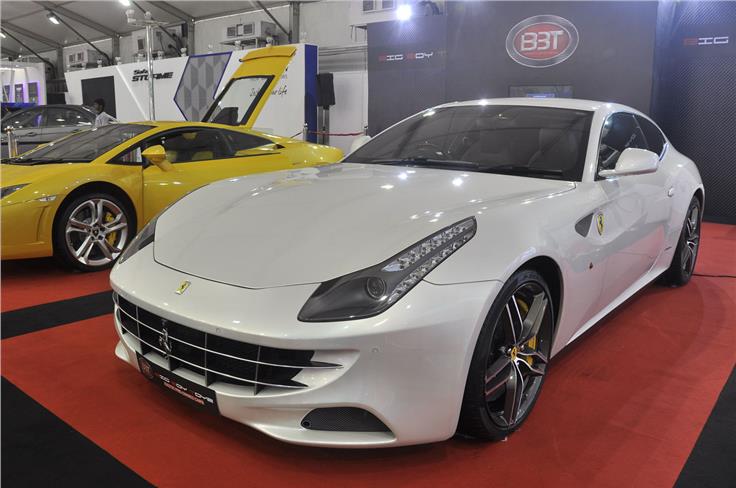 Ferrari, four seats, four-wheel drive. The FF is the sportcar maker's tourer model.