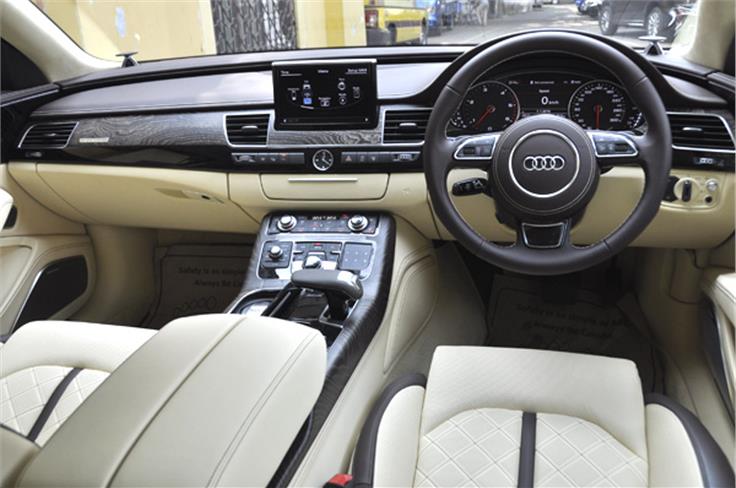 Cabin oozes quality. Pretty much every surface gets top-notch leather or wooden trim treatment.