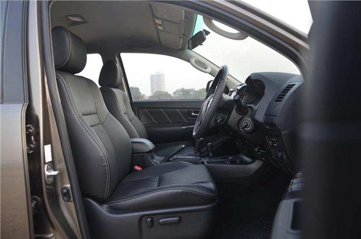The all-black interior theme continues on the front and rear seats. 