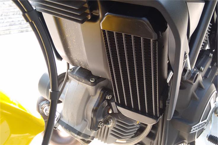The Scrambler's engine is air and oil-cooled.