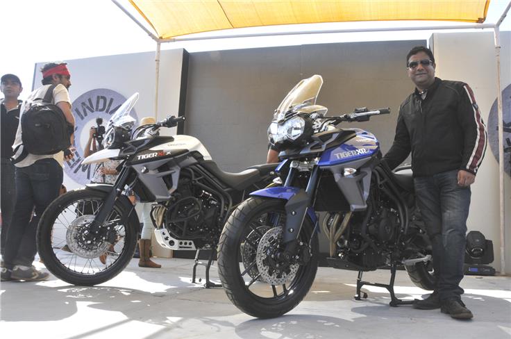 Vimal Sumbly, MD, Triumph Motorcycles, India, with the newly unveiled Tiger siblings. 