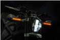 Oblong headlight and slim mirror mounted indicators herald Harley of the future.