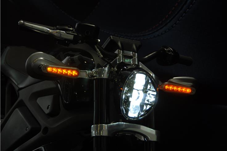 Oblong headlight and slim mirror mounted indicators herald Harley of the future.