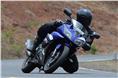 The Yamaha YZF-R15 will turn in and attack the corner with composure, feeling more stable than the RS 200. 