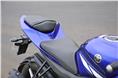 The Yamaha&#8217;s split saddle is plush enough but seats the rider with a slightly forward stance.