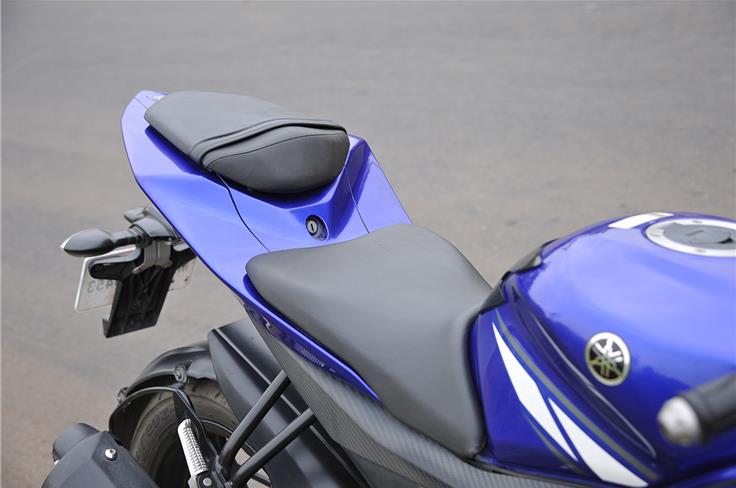 The Yamaha&#8217;s split saddle is plush enough but seats the rider with a slightly forward stance.