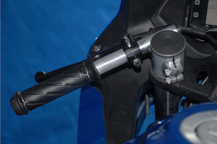 Clip-on handlebars for the Gixxer Cup motorcycles; grips remain stock.