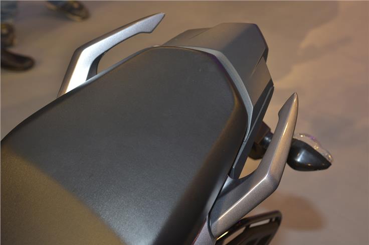 The pillion grab rails are split, and follows the more youthful and aggressive styling philosophy of the motorcycle.