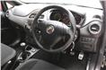 The interior is more or less unchanged save for the Abarth badging and sportier steel pedals.