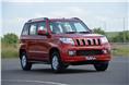 The rugged face has the Jeep-like upright chrome grille, headlamps inspired by the Bolero, and a huge air dam.