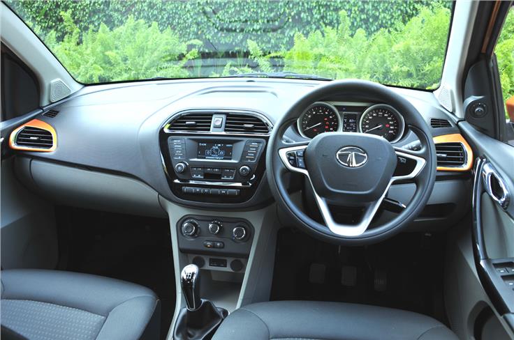 The two-tone dashboard looks smart with important controls within easy reach of the driver.