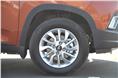 The large, squared wheel arches add to the KUV100's SUV looks, though they make the 15-inch alloys look small. 
