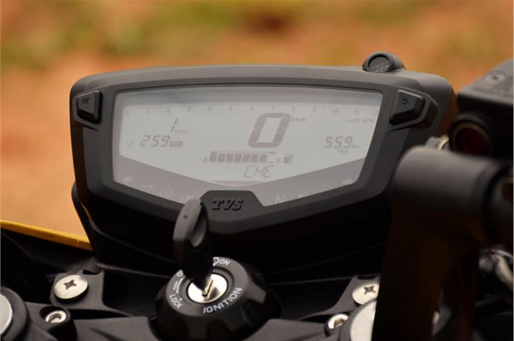The instrument cluster is an all-digital unit with a cascading tachometer and a gear shift indicator.