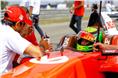 MRF brand ambassador Narain Karthikeyan with Mick Schumacher on the grid.