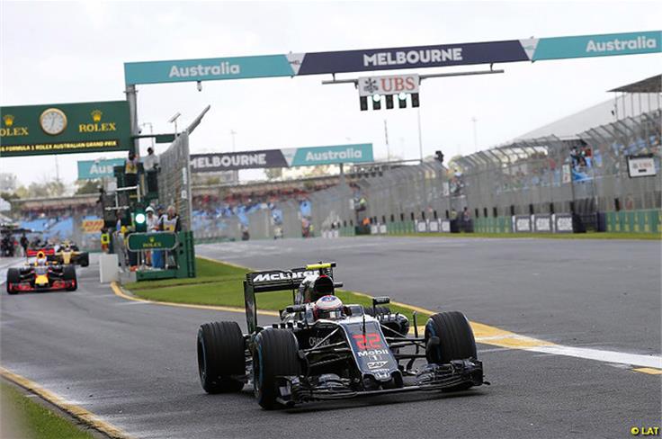 Jenson Button and Daniel Ricciardo head out of the pits, Australian Grand Prix practice 2016
