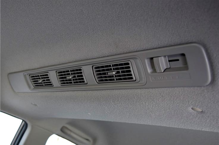 Second-row occupants get roof mounted air-con vents with blower controls.