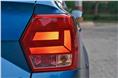 Small square tail-lamps do little to take away the abruptness of the boot.