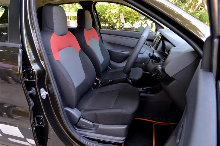 The single-piece front seats are flat but comfy enough.