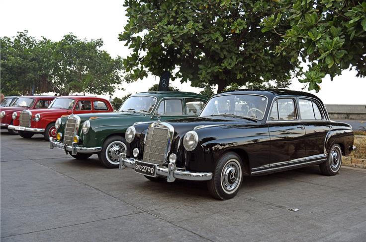 Two Mercedes-Benz W180 220S Pontons at the rally on Sunday morning.