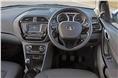 The Tigor shares its dashboard with the Tiago. However, the revised centre console is home to a new touchscreen infotainment system and automatic climate control dials.