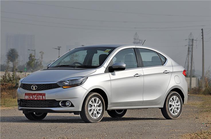 Only minor details distinguish the Tigor and Tiago till the B-pillar. The Tigor gets projector lenses and a smoked finish for its headlights.
