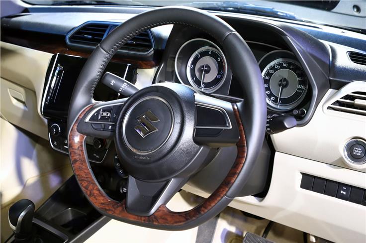 The steering design is new and gets a faux wood finish along the lower portion.