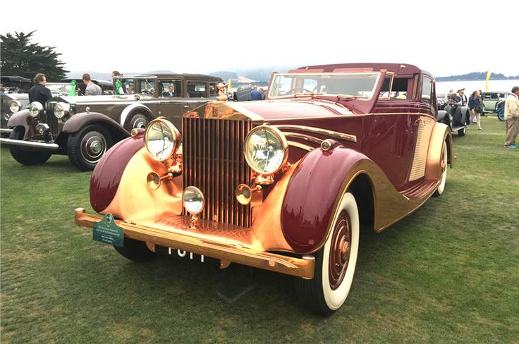 An exquisite 1937 Rolls-Royce Phantom III, adorned with copper.