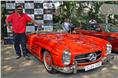 Yuvraj Gondal poses with his father's 300SL, which was the star of the show.