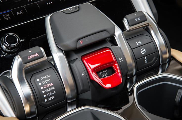 Barrel-shaped 'Tamburo' drive mode selector and the fighter jet-style flap for the engine start button are unmissable.