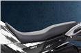 The one-piece seat extends onto the fuel tank, giving it a dual-sport-like appearance.