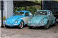 Anoop Thakur&#8217;s dual-tone Beetle strikes a pose alongside Allan Almeida&#8217;s turquoise blue Beetle. 