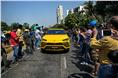 Crowds spilled onto the roads to take a closer look at all the cars.