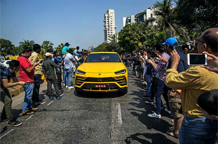 Crowds spilled onto the roads to take a closer look at all the cars.