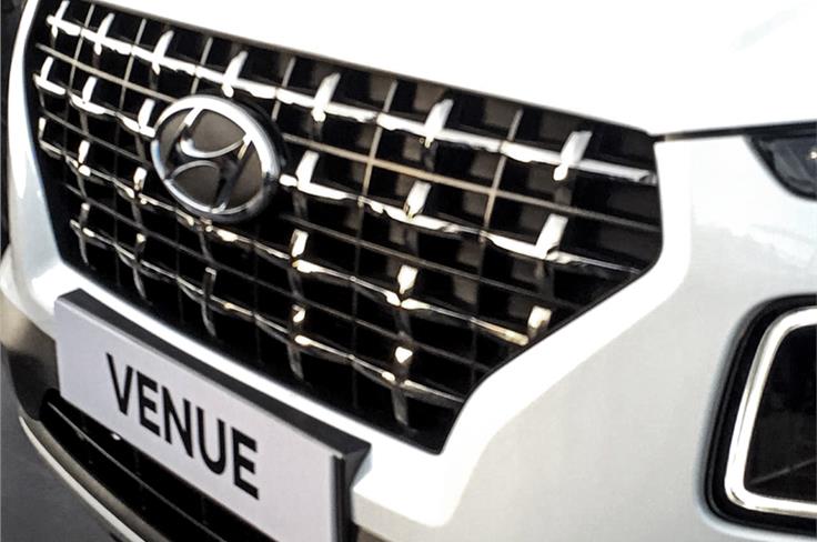 Hyundai's cascading grille design is prominent.