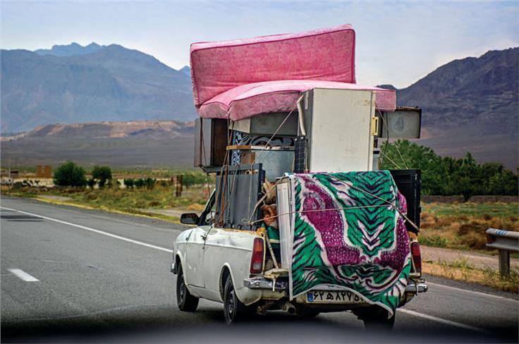 Overloaded Zamyad pick-up trucks a common sight.