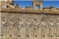Intricate stone carvings of soldiers at Persepolis.