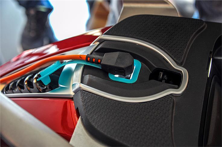 The charging port is located on the tail-end of the scooter.