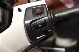 The toggle to switch between the two riding modes.