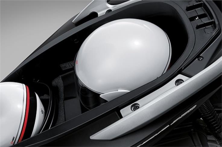 Honda claims the boot is large enough to hold two half-faced helmets.