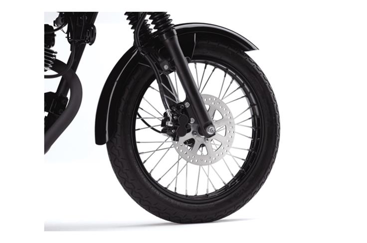 The international-spec motorcycle gets a 220mm disc up front.