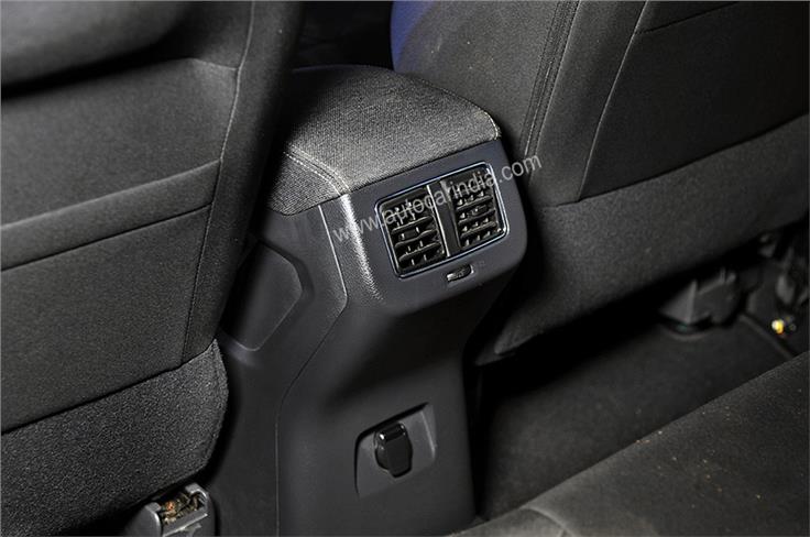 Rear AC vents and USB slot.