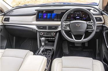 XUV700's dashboard is dominated by two 10.25-inch screens. 